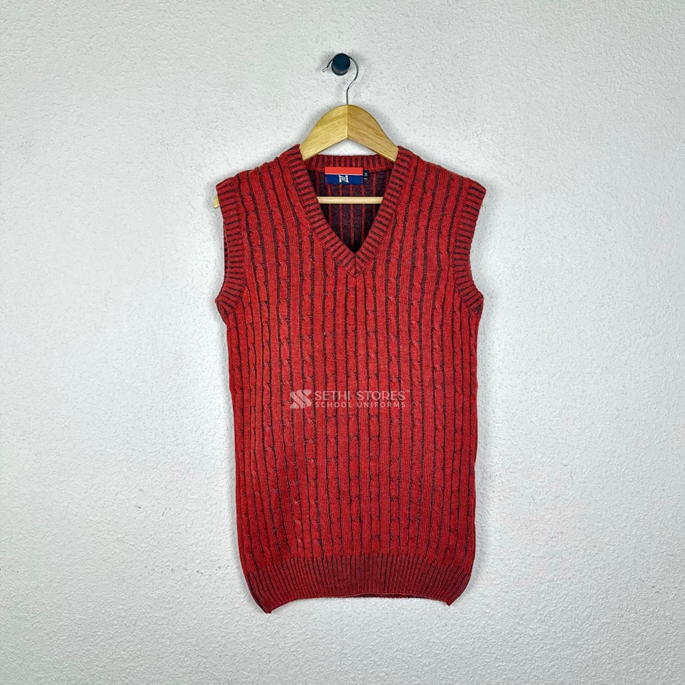 Stay warm and stylish with our G.D Goenka Public School Sleeveless Sweater in maroon colour. Made from high-quality daffodil acro wool, this sleeveless sweater provides optimal comfort and durability. Designed specifically for the G.D Goenka Public School uniform, it showcases the school logo and colors with pride. Perfect for layering, this sweater adds a touch of sophistication to your uniform. Available in various sizes, our G.D Goenka Public School Sleeveless Sweater is a must-have for a cozy and fashionable winter uniform.